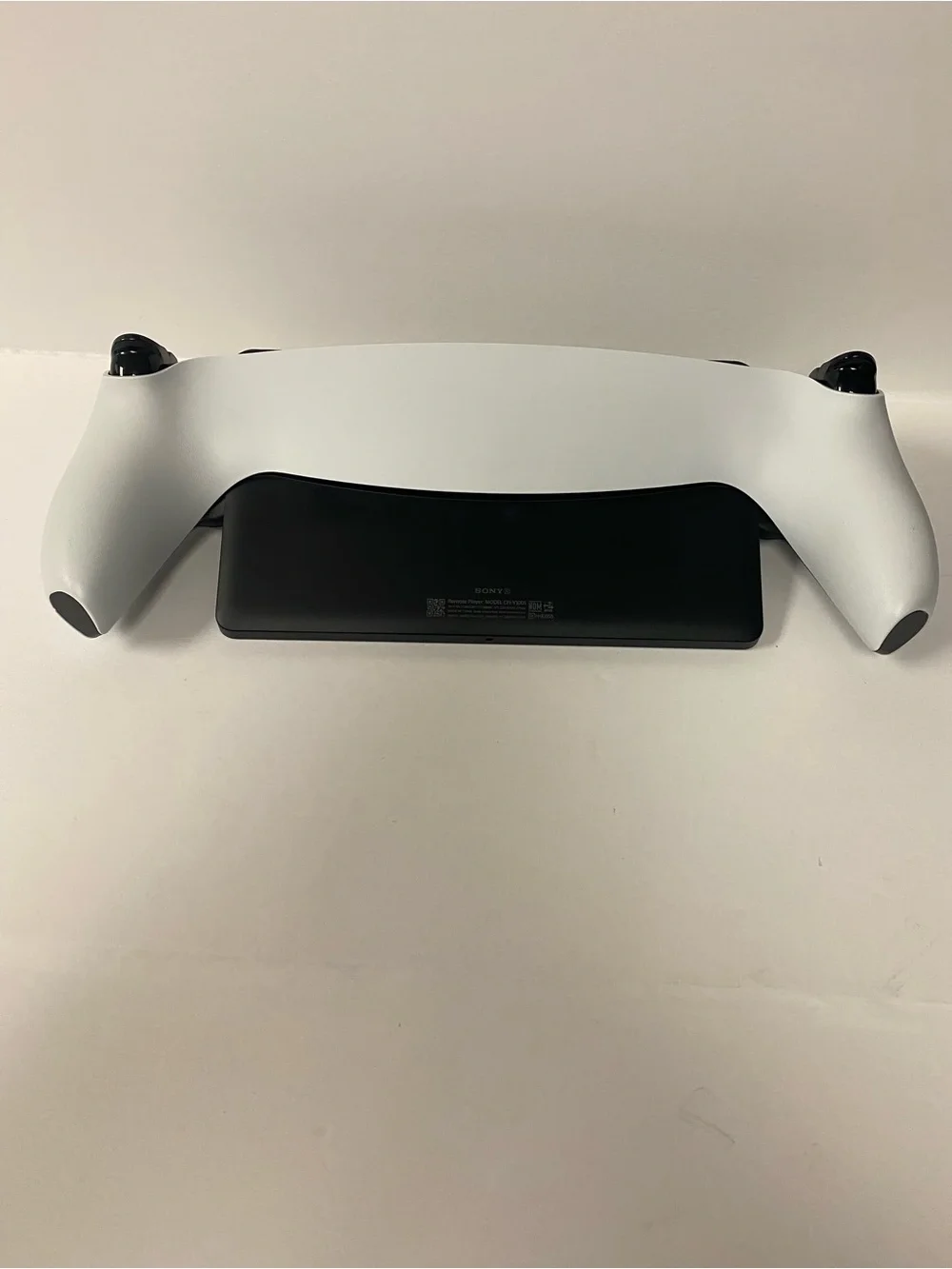 Sony PlayStation Portable-style Handheld with White Side Controllers
